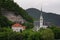 Bled Lake, shoreline mountain, alpine village in sunny weather, Slovenia, Europe.