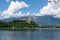 Bled - Panoramic view of St. Martina Parish Church and medieval castle at Lake Bled