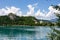 Bled - Panoramic view of St. Martina Parish Church and medieval castle at Lake Bled