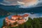 Bled, Slovenia - Aerial view of beautiful illuminated Bled Castle Blejski Grad with the Church of the Assumption of Maria