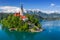 Bled, Slovenia - Aerial view of Lake Bled Blejsko Jezero with the Pilgrimage Church of the Assumption of Maria, pletna boats
