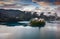 Bled, Slovenia - Magical foggy morning at Lake Bled Blejsko Jezero with the Pilgrimage Church of the Assumption of Maria