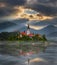 Bled, Slovenia - Misty sunrise at Lake Bled Blejsko Jezero with the Pilgrimage Church of the Assumption of Maria on an island