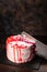 Bleeding monster cake with a knife on dark background