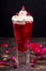 Blended strawberry shake smoothie with whole rose petals and whipped cream on black background