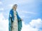 The Blessed Virgin Mary Statue blue sky background