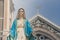 The Blessed Virgin Mary statue standing in front of The Cathedral of the Immaculate Conception at The Roman Catholic Diocese.