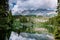 Bleu lake in the dolomites Italy, Carezza lake Lago di Carezza, Karersee with Mount Latemar, Bolzano province, South