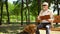 Blind man feels happy reading book, resting with dog, socially secure life