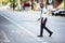 Blind Man Wearing Armband Walking With Stick