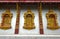 Blind windows with gilded carvings, Luang Prabang, Laos