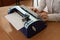 Blind woman using braille typewriter.