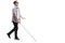 Blind young man with a cane walking