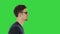 Blind young man with a cane walking on a Green Screen, Chroma Key.