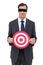 Blindfolded businessman holding a red target