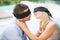 Blindfolded couple kissing