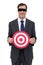 Blindfolded and smiling businessman holding a red target