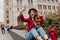 Blissful white female model in retro jeans making selfie with smile. Lovable caucasian girl in hat expressing positive