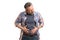 Bloated man touching abdomen