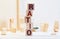 Block of alphabet letters forming the word RATIO on wooden surface. Concept of common marketing business terms. Slightly defocused