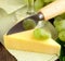 block cheese and fresh grapes