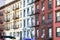 Block of colorful old apartment buildings in the Alphabet City neighborhood of Manhattan in New York City