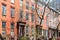 Block of historic brownstone buildings in Manhattan, New York Ci