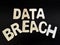 A block of letter data breach. Technology security issues