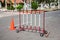 Blockage road sign red and white hurdles on the road with orange