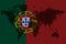 Blockchain world map on the background of the flag of Portuguese and cracks. Portuguese cryptocurrency concept