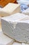 Blocks of cow cheese exposed for sale 