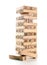 Blocks of game jenga on white background. Vertical tower whole and in game. Wooden blocks in stack with figures digit on