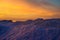 Blocks of ice on the seashore at sunset