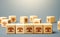 Blocks symbolizing shopping stores. Building a successful business empire. Franchise concept