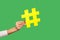 Blog comments, social media trends. Closeup of woman hand holding big yellow hashtag sign, tagging post