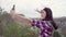 Blogger Asian backpacker woman record vlog video on top of mountain, young female happy using mobile phone make vlog video enjoy