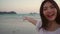 Blogger Asian woman record vlog video on beach, young beautiful female happy using mobile phone make vlog video on beach near sea