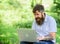 Blogger becoming inspired by nature. Man bearded with laptop nature background. Writer or blogger write post for social