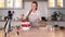 Blogger pastry chef makes a video lesson about cooking a cake.