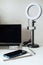 Blogging Equipment. How To Start Blog, Blogging for Beginners. Laptop, Mobile Phone, Ring Light, notebook and glasses on