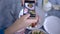 Blogging, mobile phone in female hand female take pictures healthy vegetarian salad during brunch for social media