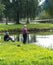 Blome / Latvia - August 20th, 2018: Photo of Two Millennials Fishing - Spending Quality Leisure Time