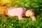 Blond bavarian man sleeping in the grass