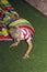 Blond boy play crawling through tube in kids zone in amusement p