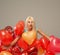 Blond cheerful woman with red balloons heart