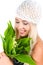 Blond girl with a bouquet of lilies of the valley