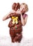 Blond Girl Hiding the eyes of a Chocolate Bunny