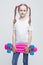 Blond Girl with Nice Pigtails Posing With Pink Pennyboard