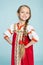 Blond girl in the Russian folk costume