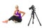 Blond girl in sportswear doing sports in front of the camera on a white background